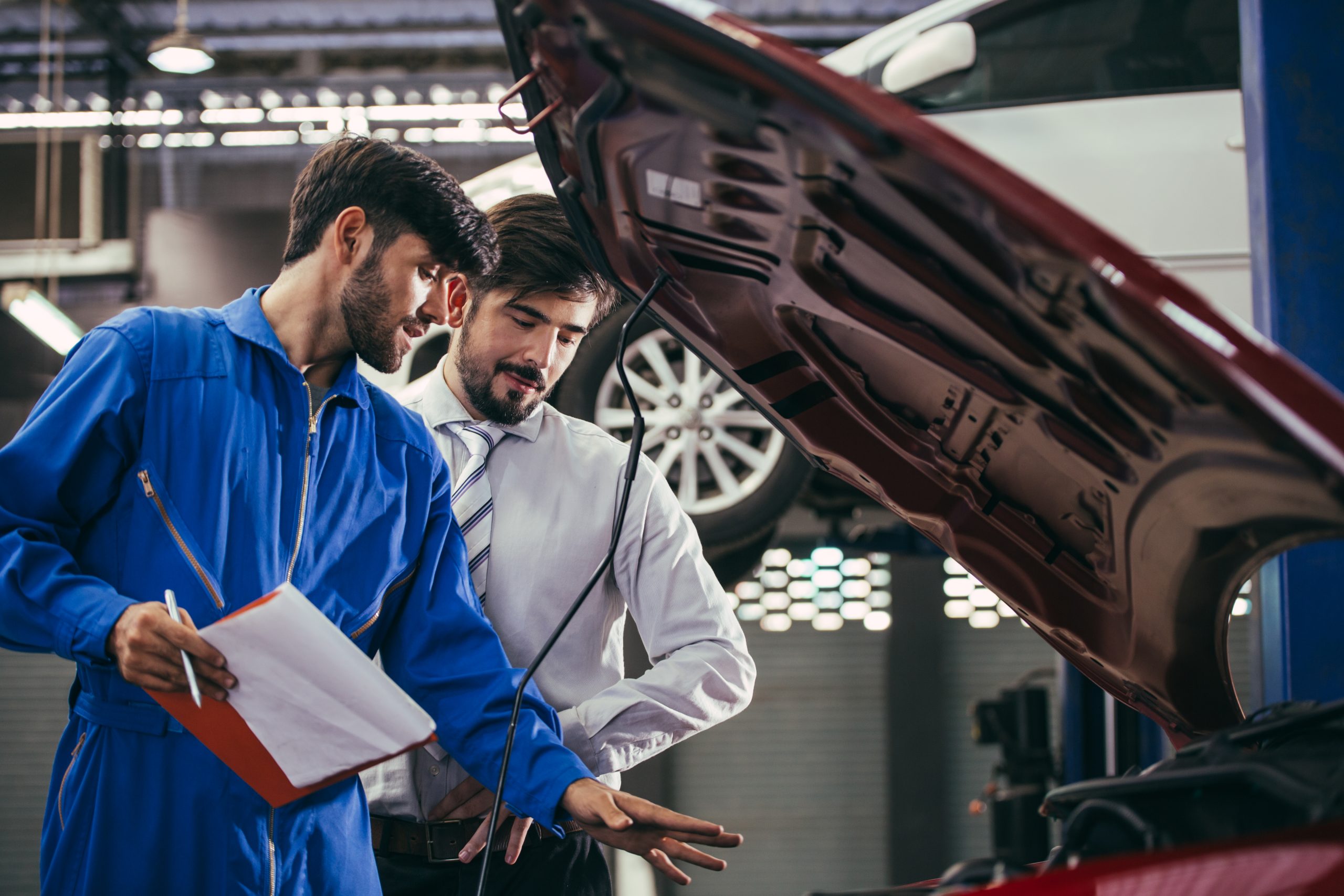 Automotive maintenance mechanic explain repair condition to cust