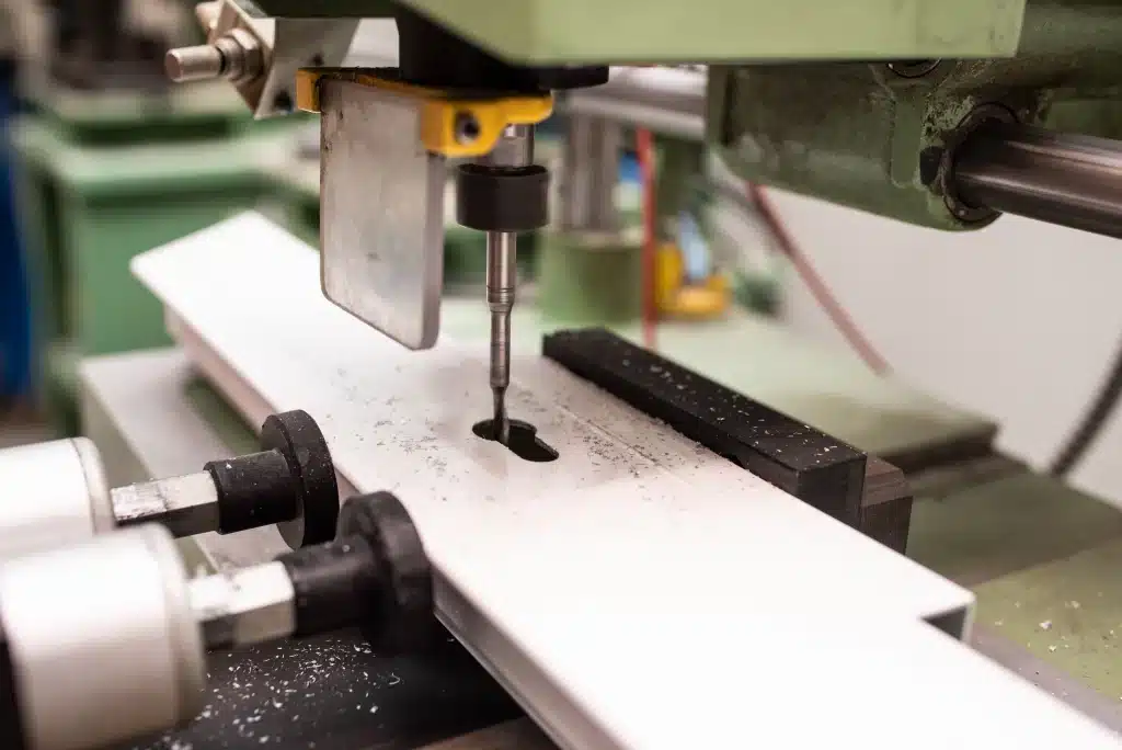 engineer working on manufacturing machine